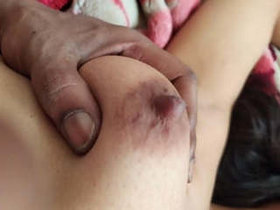 A passionate South Asian couple engages in intense sexual activity in this video