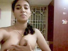 Village girl with a pretty face reveals her breasts