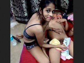 Indian housewife fondles her breasts and rubs her vagina