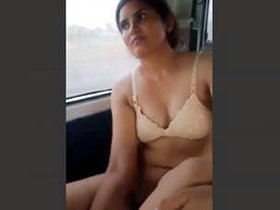 Indian aunty and her young partner have sex in a car