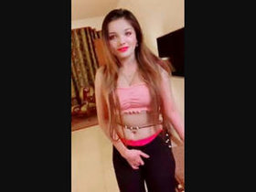 A seductive Pakistani woman reveals her breasts