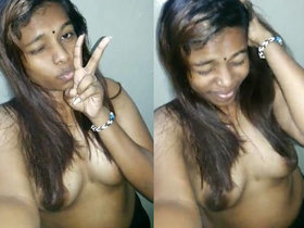 Malaysian Indian college girl takes selfie video for her boyfriend