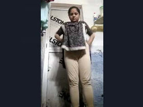 Video of an Indian girl taking a bath