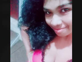 A pretty Sri Lankan girl reveals her breasts and vagina