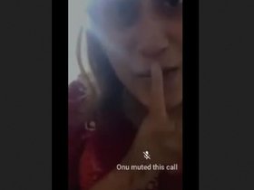 A stunning Latina woman entices and provokes while putting on a show