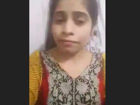 A wife dresses up and records an intimate video for her husband