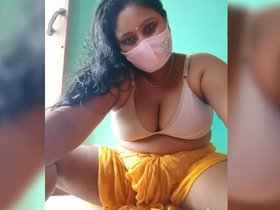 Busty bhabi in a steamy live performance