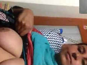 Indian aunt's breasts and vagina on display in a live video performance without audio