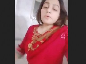 Alice, the attractive young woman, proudly displays her lovely pussy in this sensual video