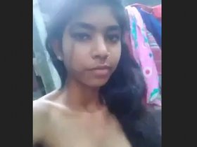 Young woman displaying her assets, featuring a desi bhabi