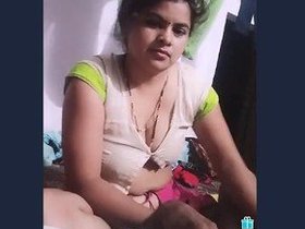 Indian wife gives a small handjob in this video