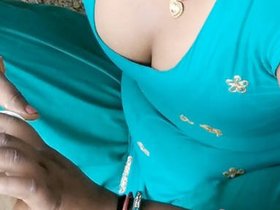 Village woman with large breasts from India showcases her sensuality