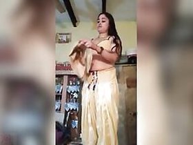 Dehati Cute Bhabhi undresses teases reveals Dehati MMC