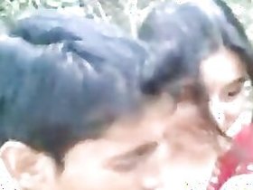 Young couple having romantic carnal pleasures outdoors