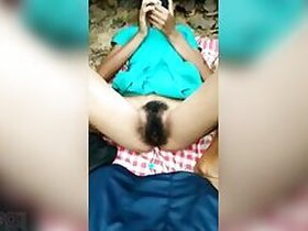 Indian village schoolgirl shows her pussy outdoors