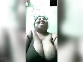 Modest mature Desi shows off her saggy XXX boobs during a video call