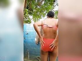 Hot Bhabhi stripped MMS episode with outdoor bath