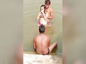 XXX video of girl Desi flirting with a bunch of guys in the river