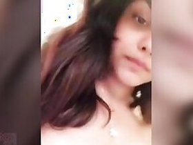 Desi's wife exposes naked breasts with pale nipples in MMC video