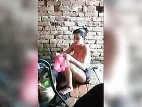 Rustic Desi Indian girl with big tits bathing