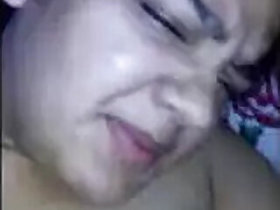 A pretty girl, shoving her cock into her tight ass, began to moan loudly