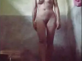 Busty wife Desi bathes nude