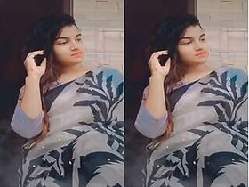 A horny Indian woman shows off her tits and wet pussy.