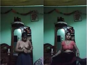 Bowie takes off her sari and shows off her naked body.